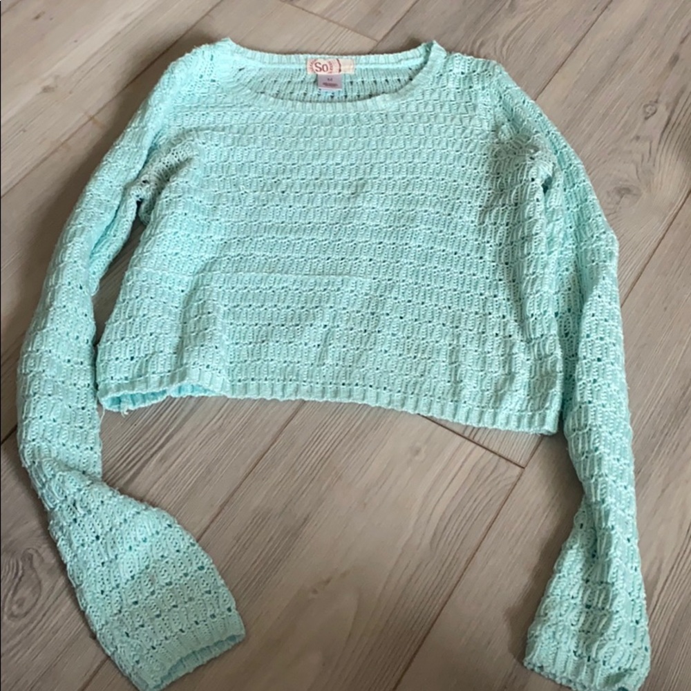 greenish teal sweater